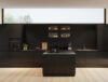 Ultimate Minimalist Black Kitchen: Seamless Design with Light Wood Contrast - Image 2