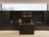 Ultimate Minimalist Black Kitchen: Seamless Design with Light Wood Contrast