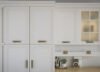 Refined Classic Kitchen: Cream Cabinetry, Natural Wood Island, and Traditional Accents - Image 3